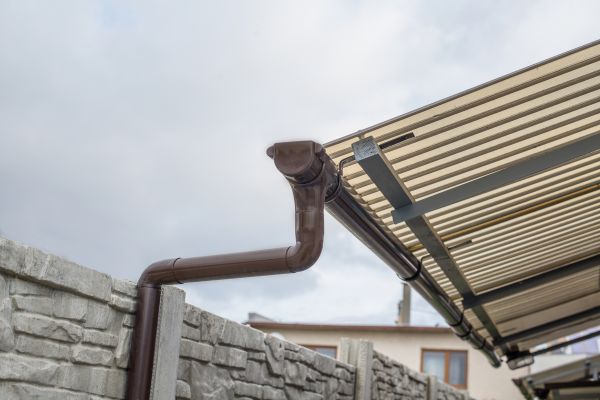 Plastic Downspout Installation in Loveland